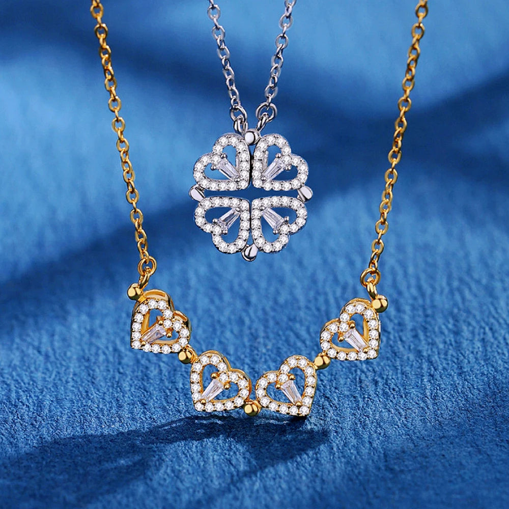 BARESY gold heart chain and silver clover pendant displayed on blue backdrop stainless steel magnetic pendant necklace