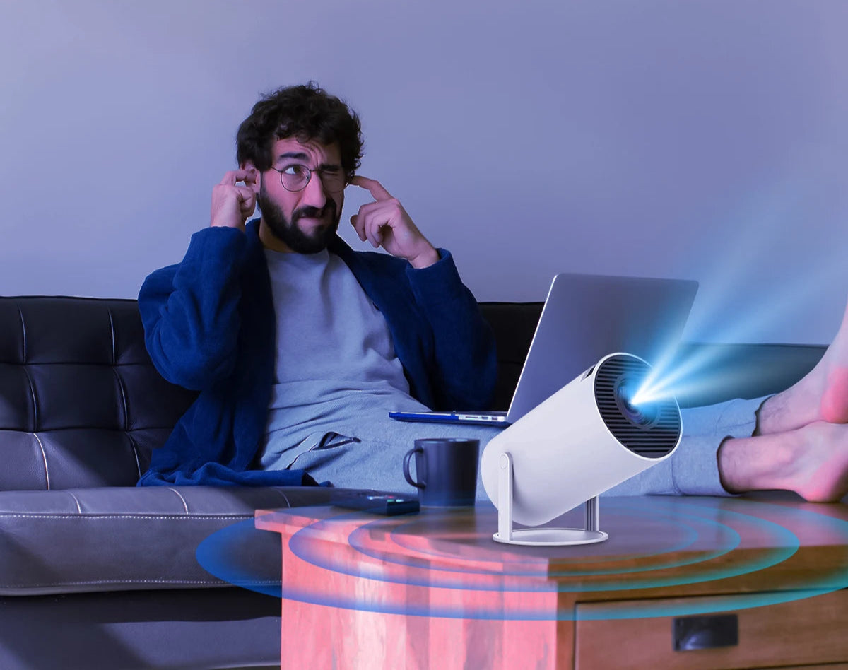 BARESY 4K outdoor home cinema projector on coffee table projecting blue light in living room with man on couch
