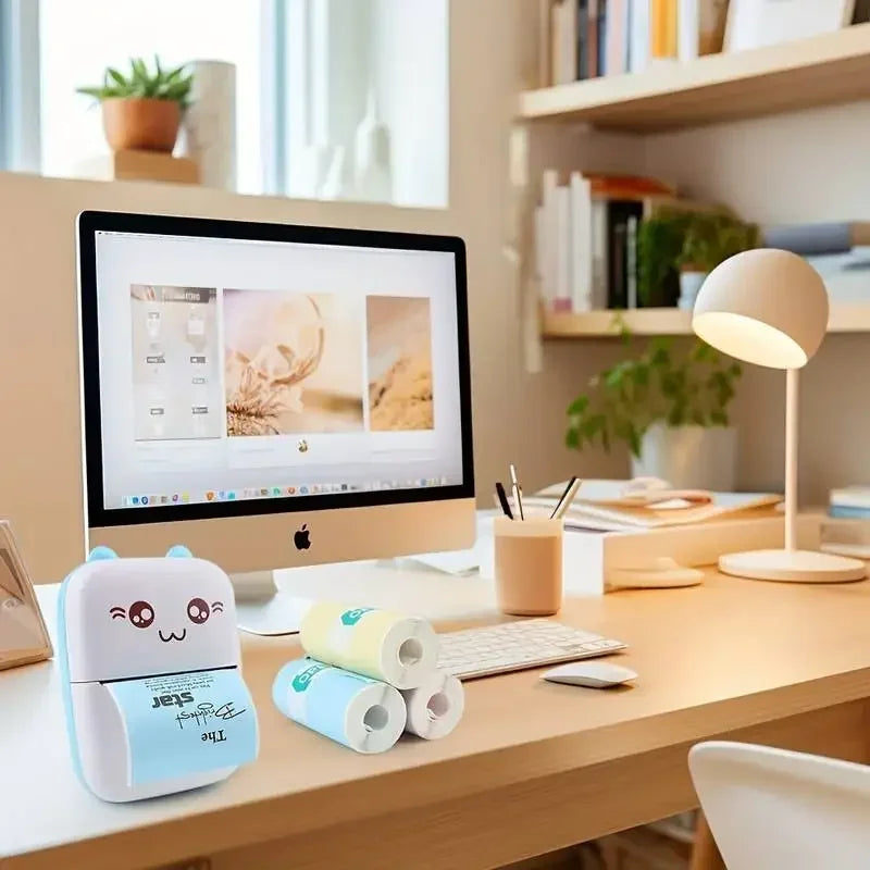BARESY color mini printer sticker paper rolls and cute portable sticker printer on a home office desk