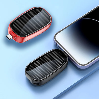 BARESY emergency phone power bank 1200mAh solar compact USB C plug portable charger next to smartphone