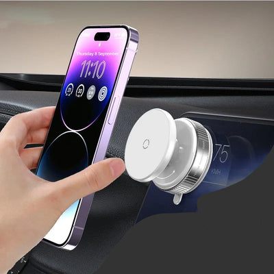 BARESY silver magnetic phone mount for car on dashboard with hand placing purple iPhone 15