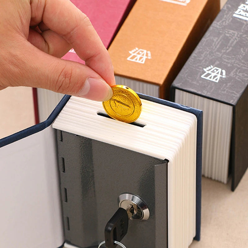 BARESY book shaped automatic safe piggy bank for kids with key lock and coin slot being used